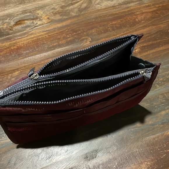 Travel maroon toiletry bag. 10” long by 6” tall. - Picture 5 of 9
